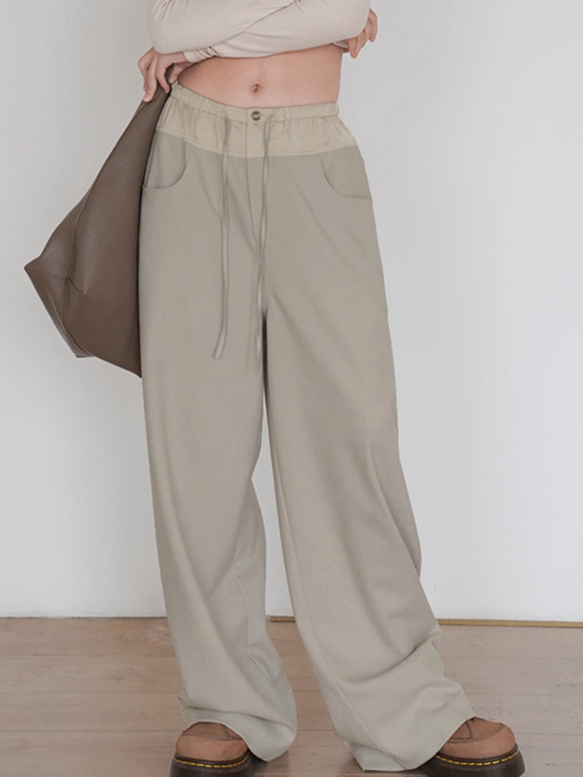 Plunora - Wide Leg Broek met Knoopdetail