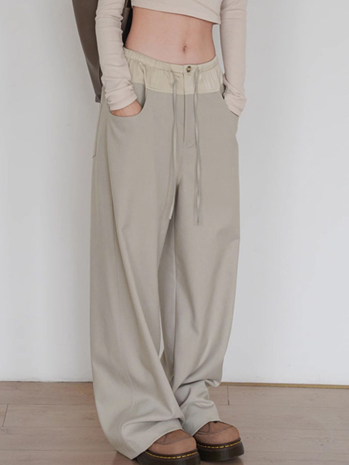 Plunora - Wide Leg Broek met Knoopdetail