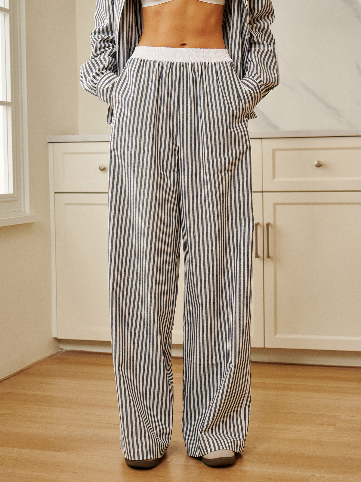 Plunora - Pinstripe Wide Leg Broek met Contrasterende Bies