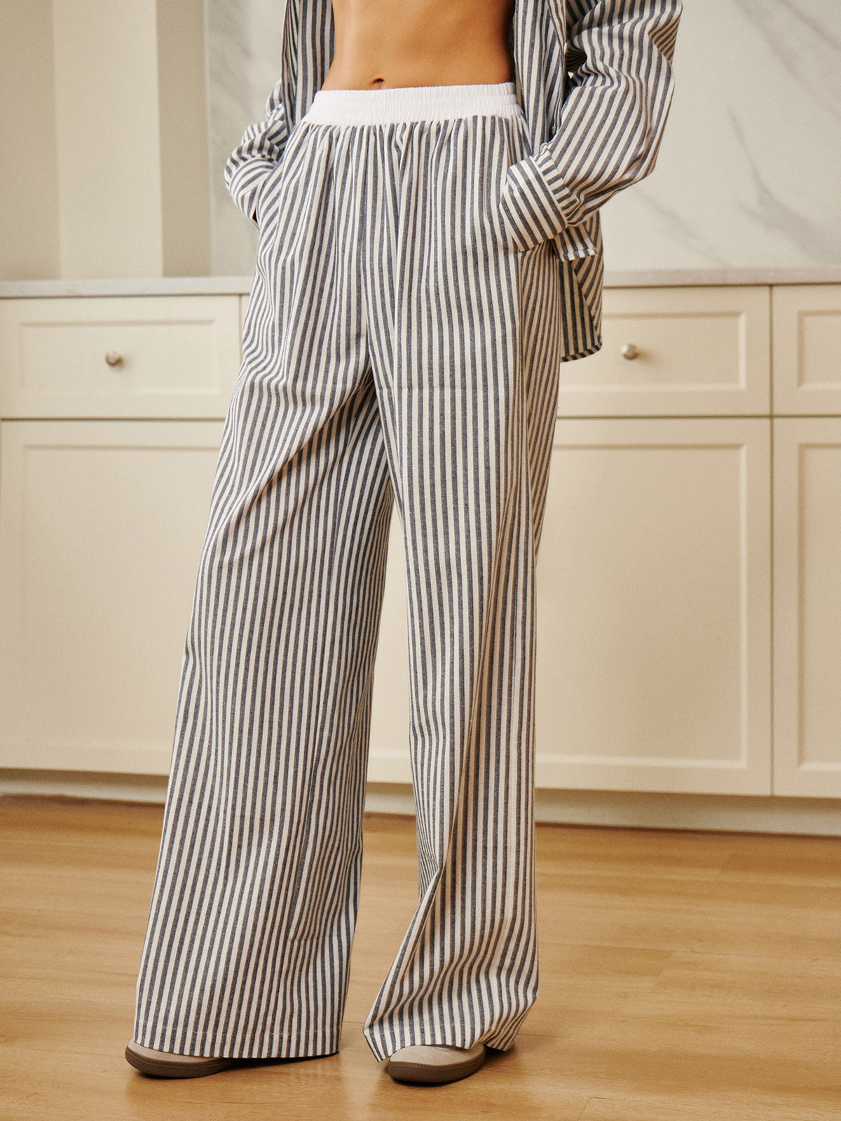 Plunora - Pinstripe Wide Leg Broek met Contrasterende Bies